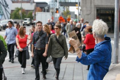 Anti Poverty Activists Hand Out "Chew On This!" bags in downtown Toronto
